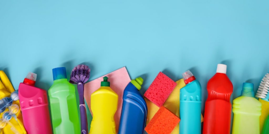 cleaning supplies against a background of blue