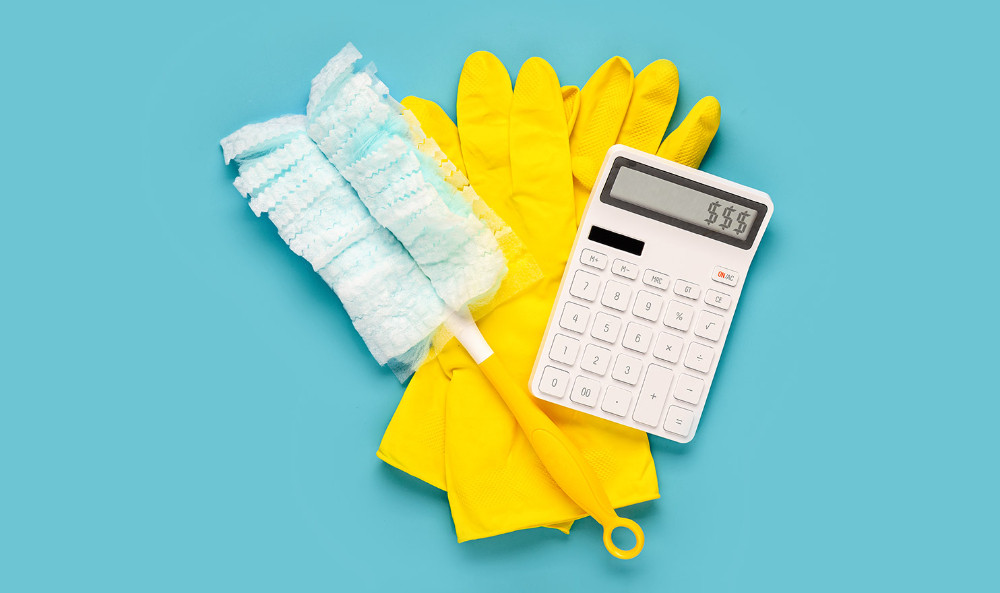 image of a swifter duster, cleaning gloves, and a calculator stacked on top of each other