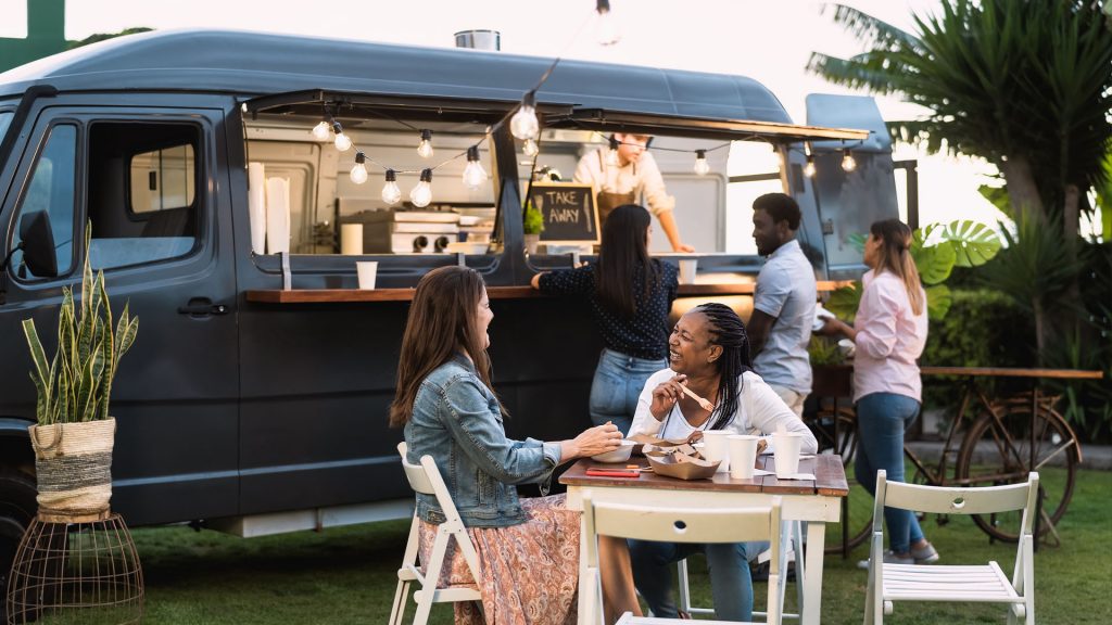 A food truck at a cannabis themed event.