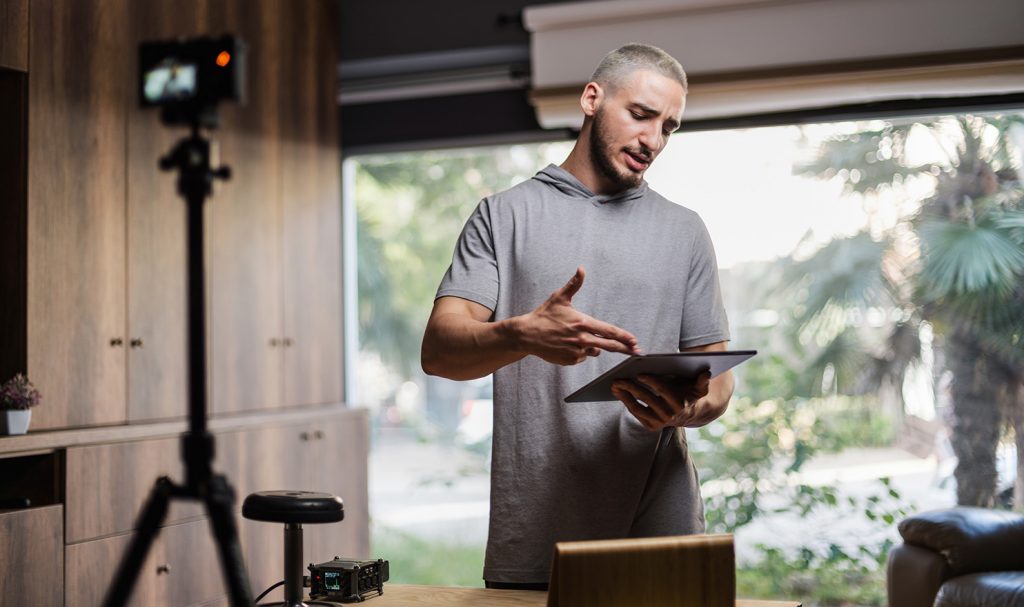 A virtual personal trainer is speaking with a client online about a new technique he wants to try out since he just learned about it in his recertification course.