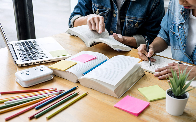 A tutor has prepared materials and insurance for a tutoring lesson.