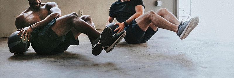 athletes train with medicine balls.