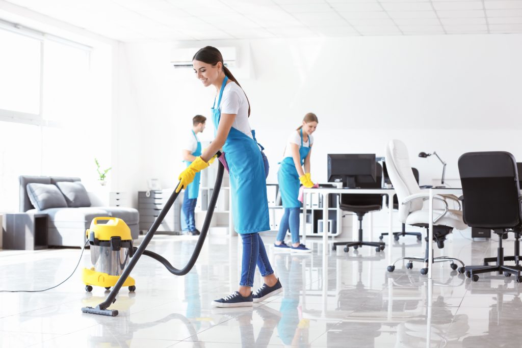 group of women cleaning office space