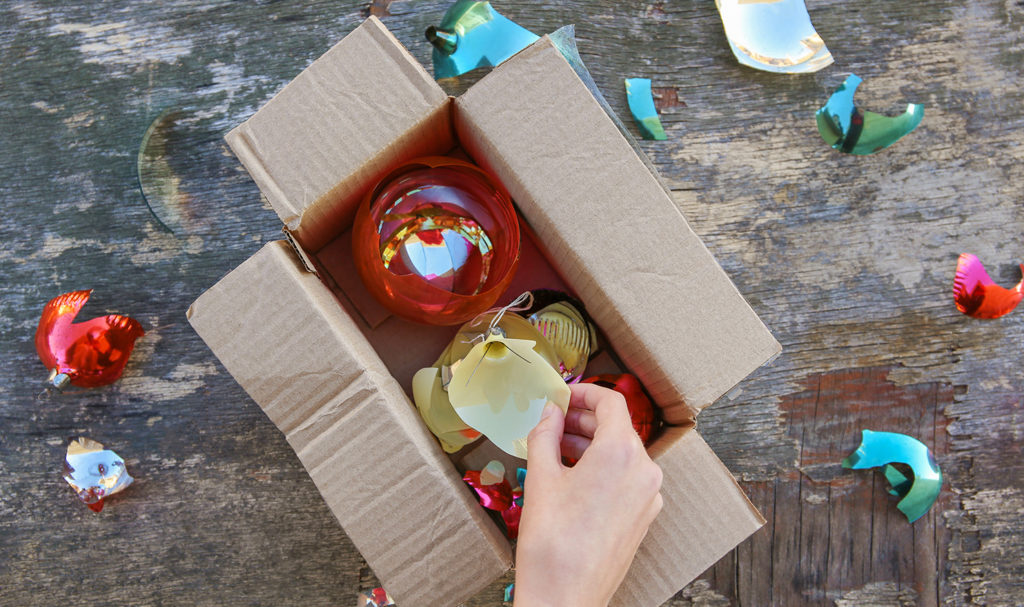 A box of broken ornaments in a box risks cutting the hand of a customer. Product liability insurance may help with this type of claim.