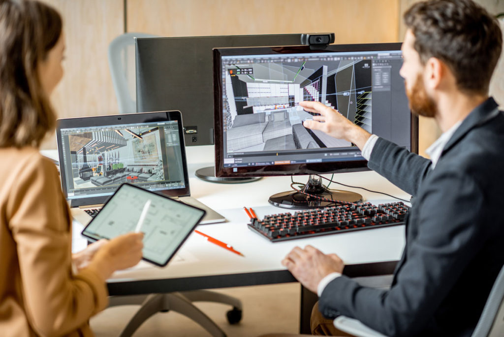 Interior designer working on computer mock up