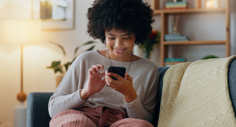 woman on phone scrolling social media