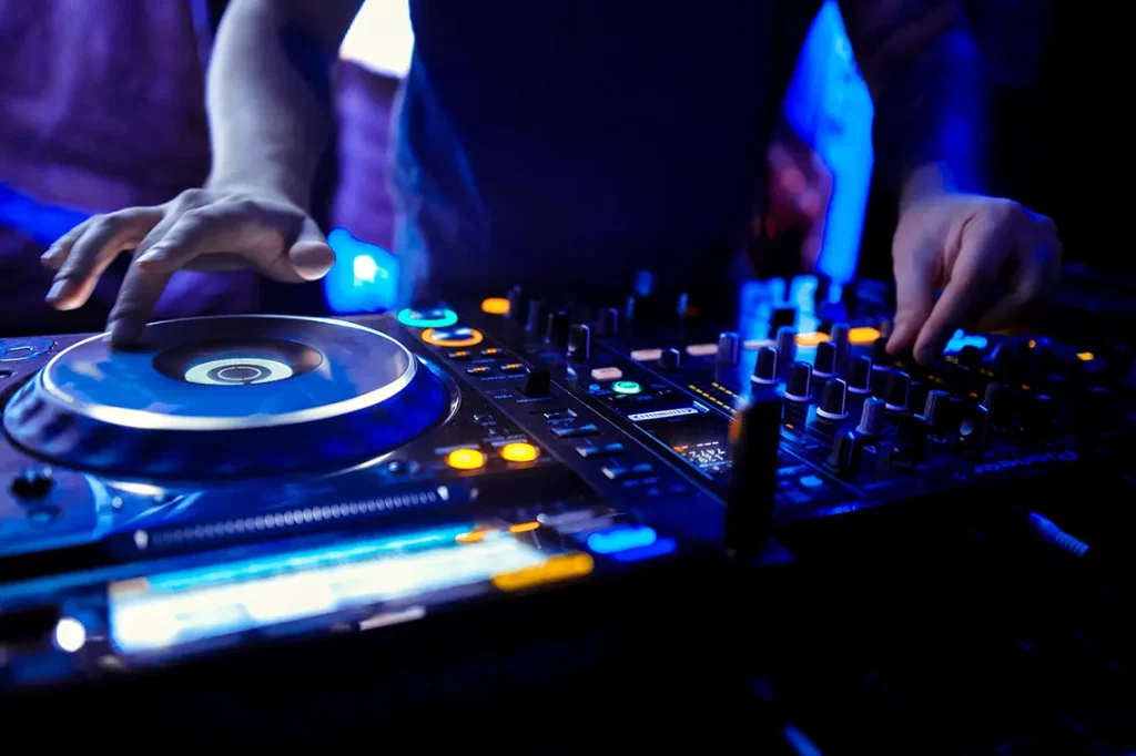 DJ at a club with turntable