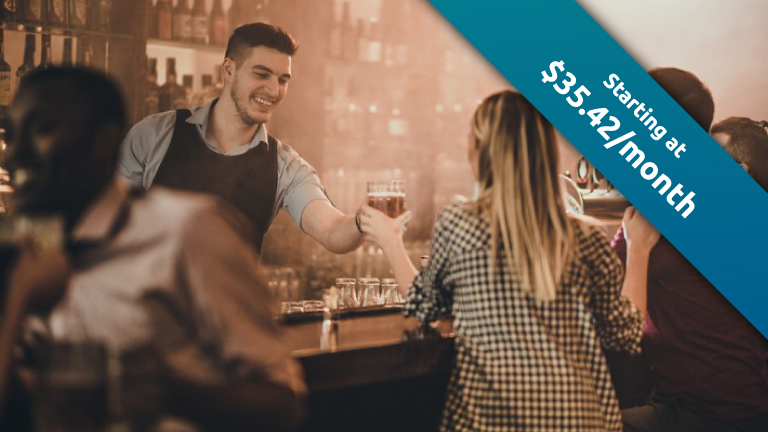 A bartender serves drinks with a smile, Bartender Business Insurance starting at $35.42 /month.