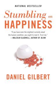 book cover for stumbling on happiness