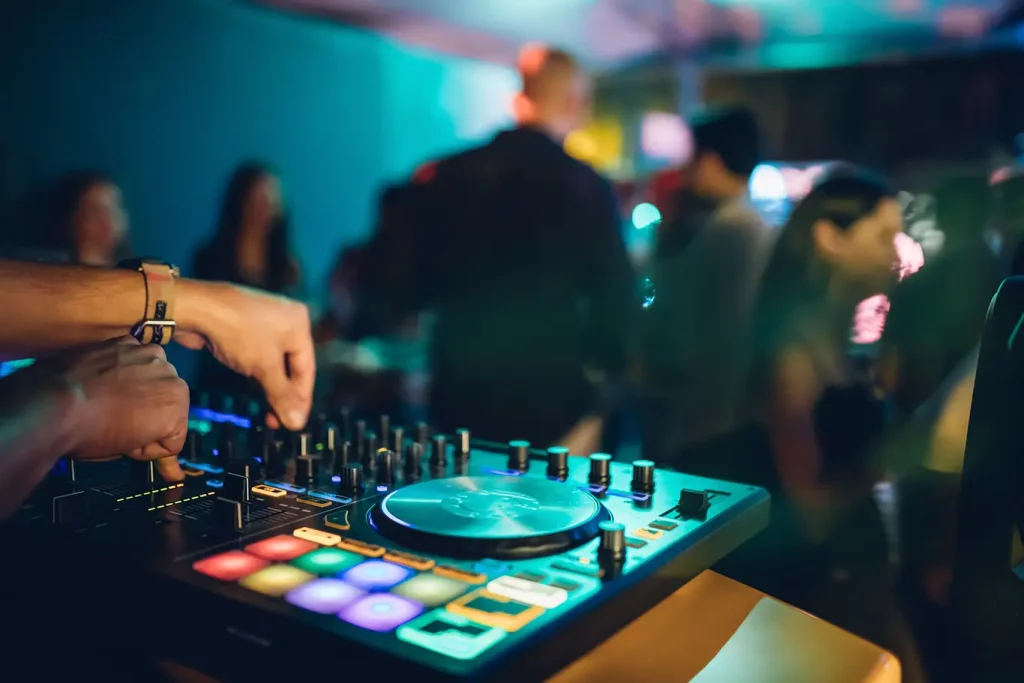 DJ using a controller for an event.