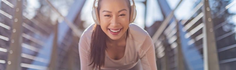 woman listening to music while working out
