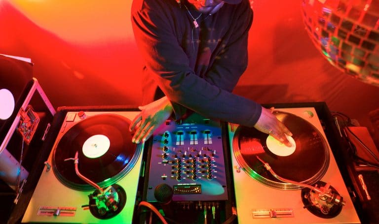 DJ mixing at party