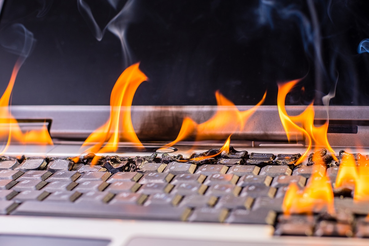 A computer catches on fire, posing a legal risk.