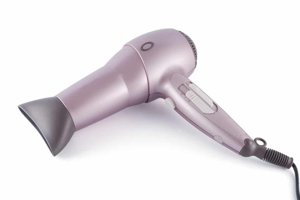 A hair dryer on a white background