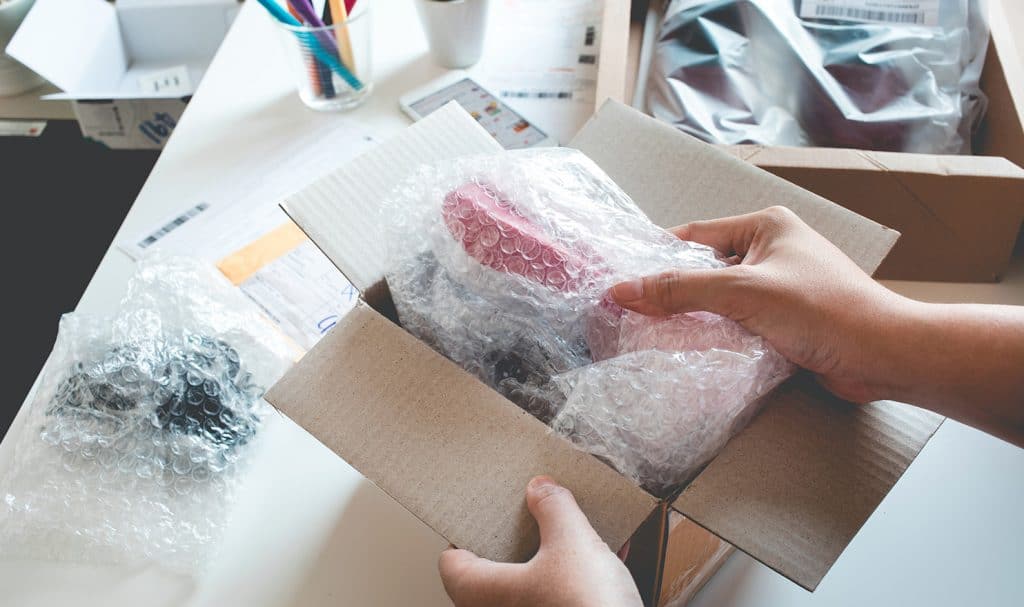 An online seller packages up an order for shipping with bubble wrap, knowing if anything happens they are covered with product liability and inland marine insurance.