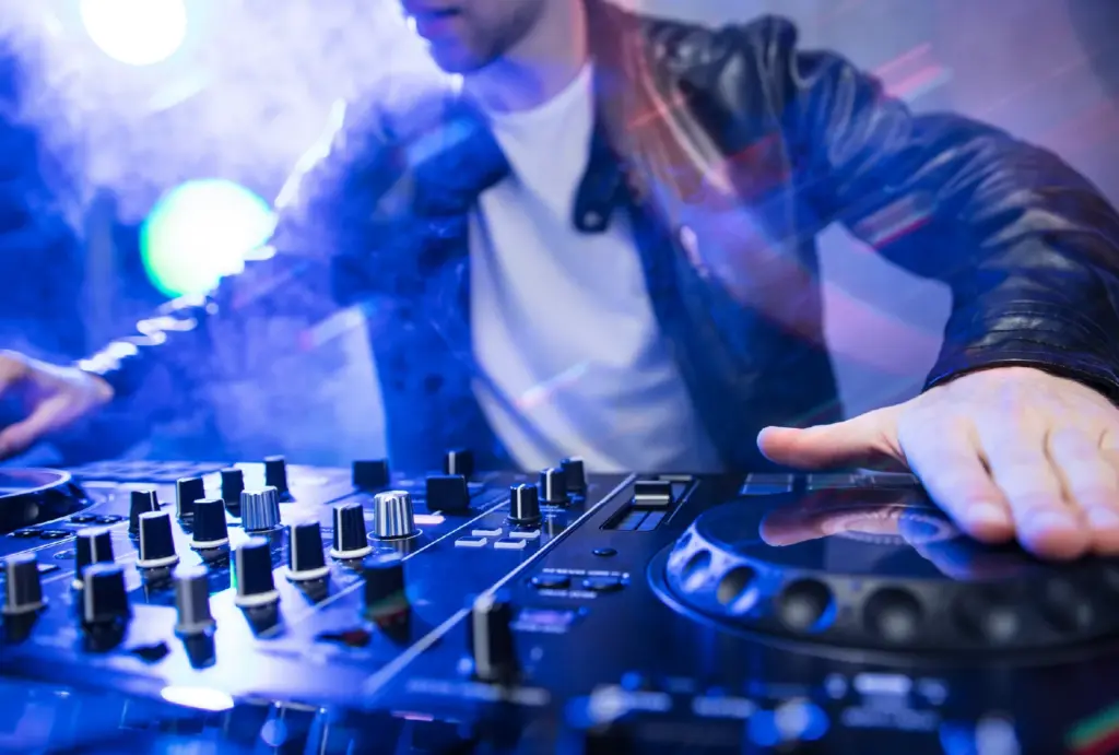 A DJ mixing it up at a festival.